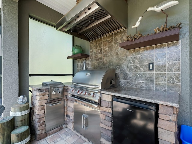 4658 W Hacienda Dr, Beverly Hills, FL 34465 - view of patio with grilling area and an outdoor kitchen