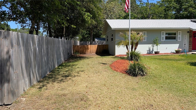 view of yard featuring a fenced backyard
