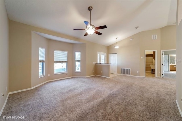 empty room featuring visible vents, ceiling fan, and light colored carpet