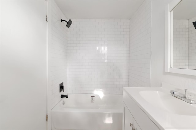 full bathroom with shower / washtub combination and vanity
