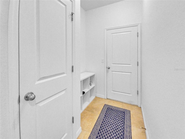 5198 NE 19th Pl, Ocala, FL 34470 - mudroom featuring light tile patterned floors