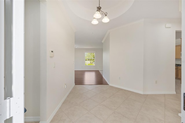8632 SW 86th Cir, Ocala, FL 34481 - interior space featuring an inviting chandelier, baseboards, ornamental molding, and light tile patterned flooring