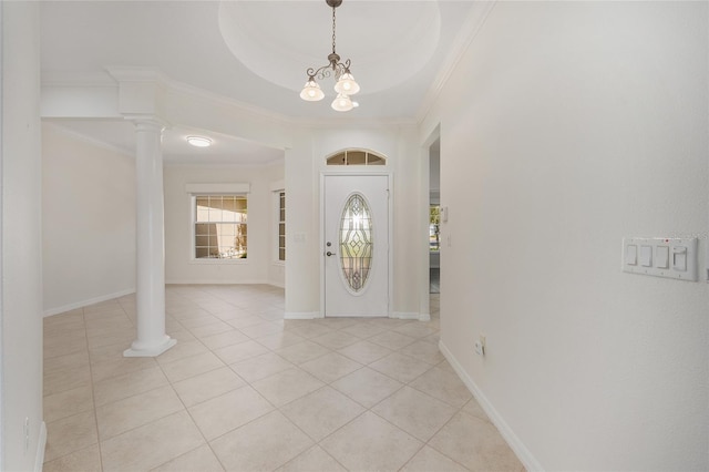 8632 SW 86th Cir, Ocala, FL 34481 - entryway with crown molding, baseboards, and light tile patterned floors
