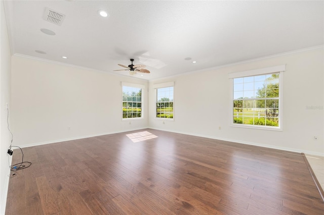 8632 SW 86th Cir, Ocala, FL 34481 - spare room with crown molding, visible vents, wood finished floors, baseboards, and a ceiling fan