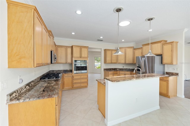 8632 SW 86th Cir, Ocala, FL 34481 - kitchen with dark stone counters, ornamental molding, a kitchen island with sink, and stainless steel appliances