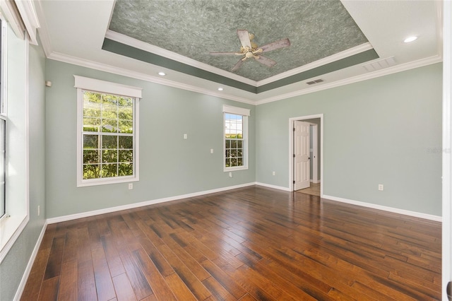 8632 SW 86th Cir, Ocala, FL 34481 - spare room with visible vents, hardwood / wood-style floors, baseboards, a raised ceiling, and a ceiling fan