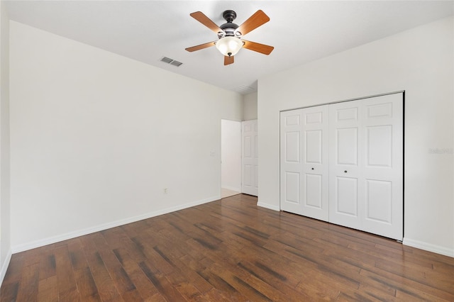 8632 SW 86th Cir, Ocala, FL 34481 - unfurnished bedroom featuring visible vents, a closet, baseboards, ceiling fan, and dark wood-type flooring