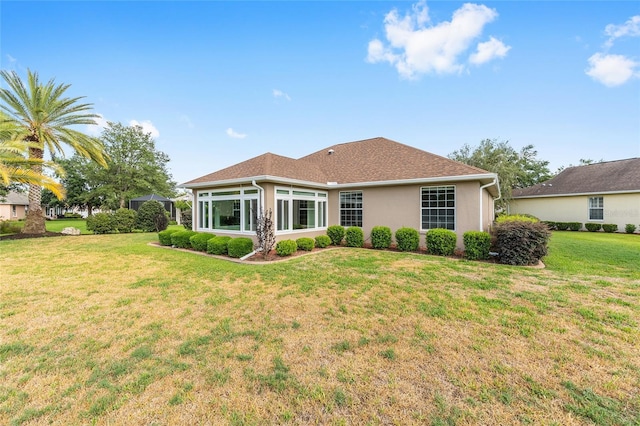8632 SW 86th Cir, Ocala, FL 34481 - back of property featuring a lawn and stucco siding