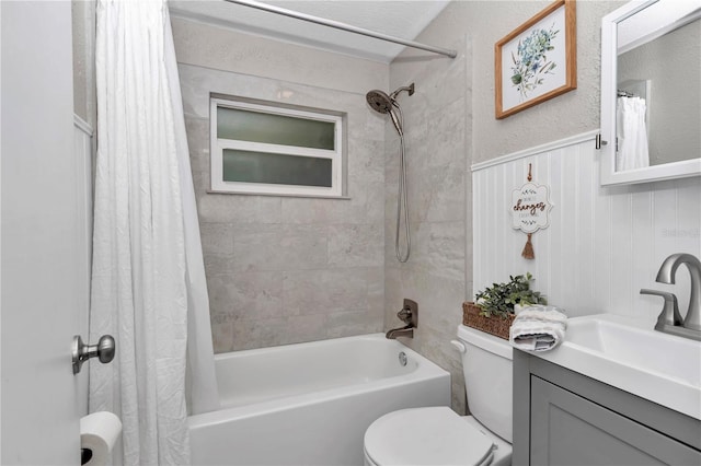 4180 W Anthony Rd, Ocala, FL 34475 - bathroom featuring shower / bath combo with shower curtain, toilet, vanity, and wainscoting