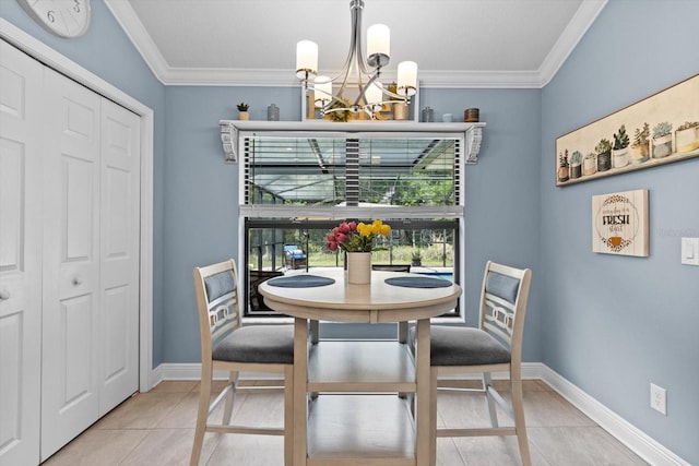dining area featuring baseboards, an inviting chandelier, crown molding, and light tile patterned floors