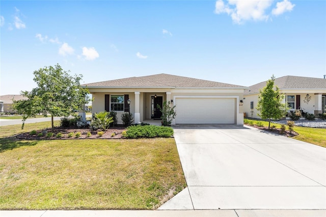 8952 SW 79th Ln, Ocala, FL 34481 - single story home featuring stucco siding, driveway, a front yard, and a garage