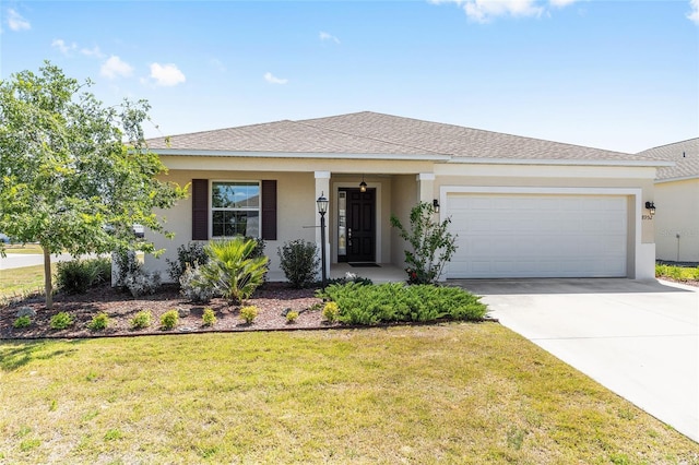 8952 SW 79th Ln, Ocala, FL 34481 - ranch-style home featuring an attached garage, a front yard, and stucco siding