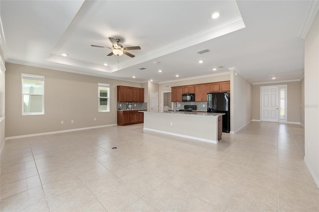 8952 SW 79th Ln, Ocala, FL 34481 - unfurnished living room featuring recessed lighting, a raised ceiling, visible vents, and light tile patterned floors