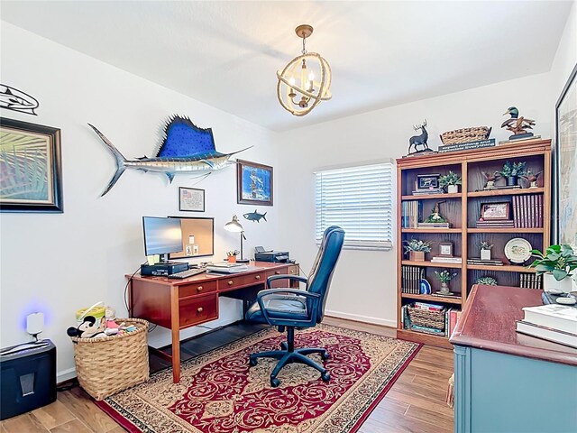 4806 SW County Road 769, Arcadia, FL 34269 - office area featuring light wood-style floors, baseboards, and a chandelier