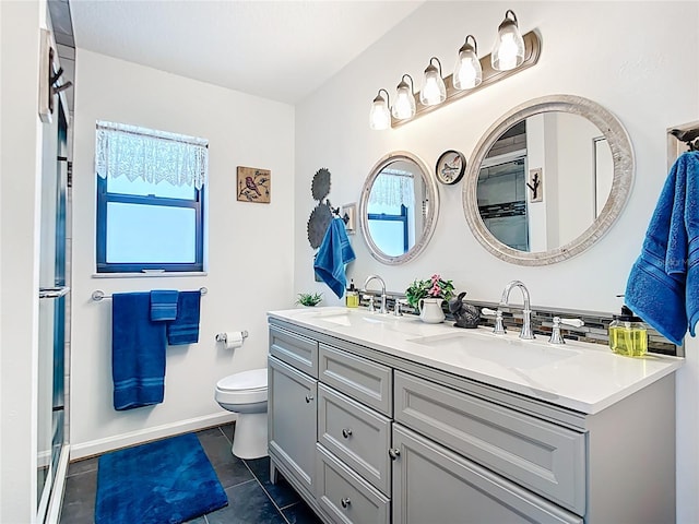 4806 SW County Road 769, Arcadia, FL 34269 - bathroom with a sink, tile patterned flooring, double vanity, toilet, and baseboards