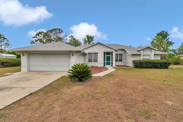 ranch-style house featuring stucco siding, an attached garage, driveway, and a front lawn