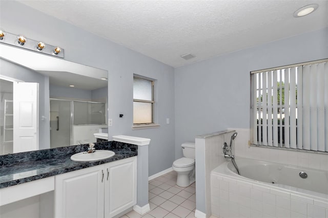 full bathroom with a stall shower, tile patterned flooring, a jetted tub, vanity, and baseboards