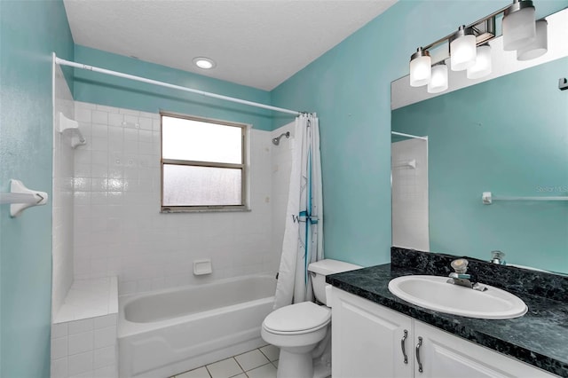 bathroom featuring tile patterned flooring, shower / tub combo, toilet, and vanity