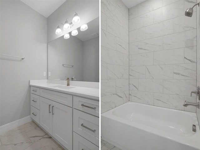 full bathroom featuring shower / bath combination, vanity, baseboards, and marble finish floor