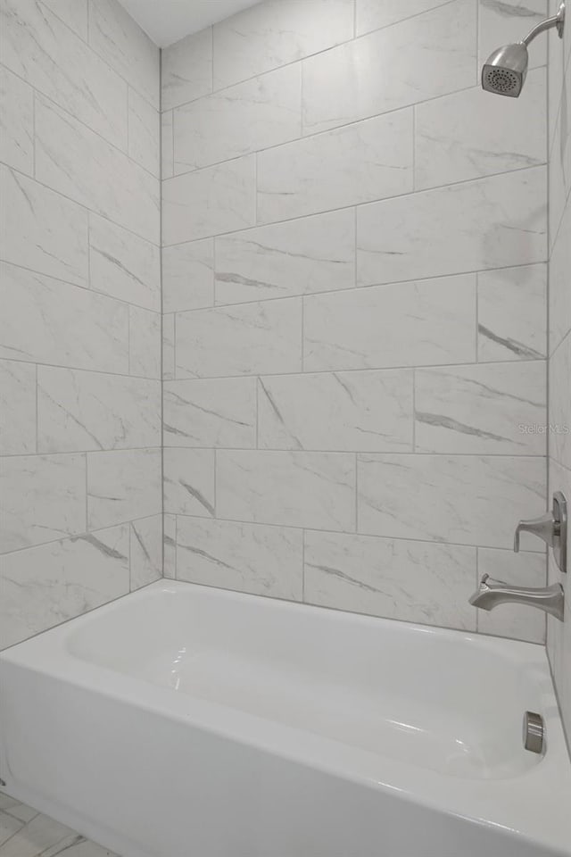 full bathroom with shower / bathing tub combination