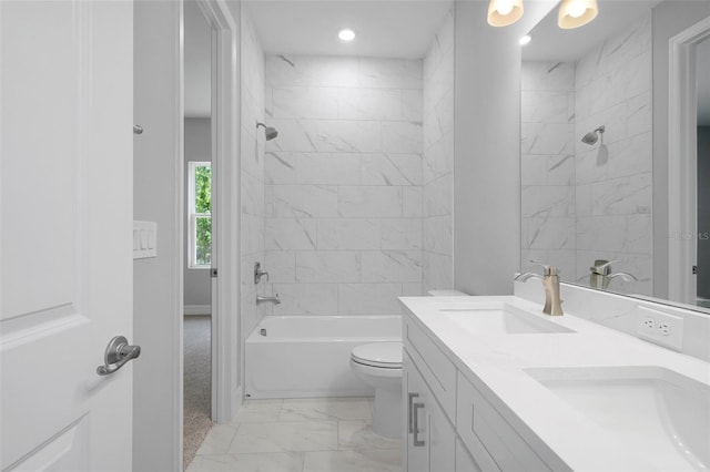 full bathroom with toilet,  shower combination, a sink, and marble finish floor