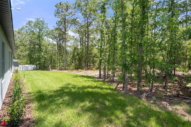 view of yard with fence