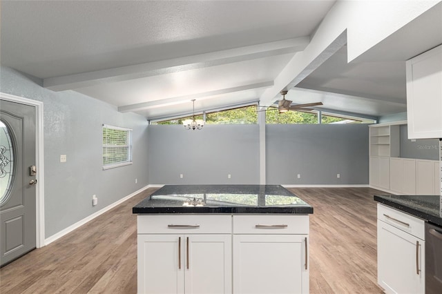 kitchen with white cabinets, light wood-style flooring, baseboards, and ceiling fan