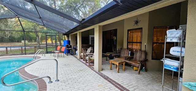 pool featuring a lanai and a patio