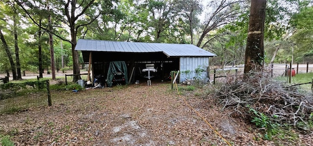 view of pole building with a detached carport
