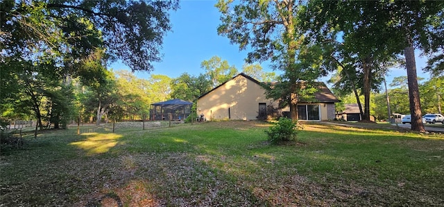 view of yard with fence