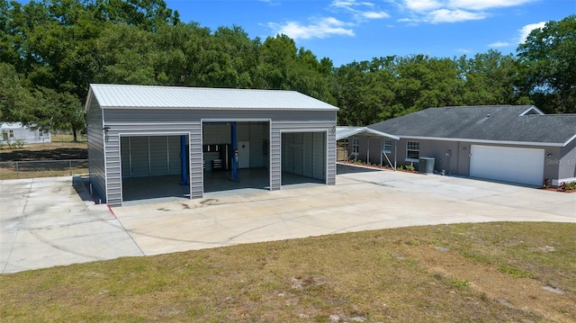 detached garage with central AC and fence