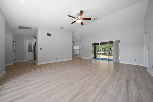 unfurnished living room featuring baseboards, a ceiling fan, visible vents, and light wood-style flooring