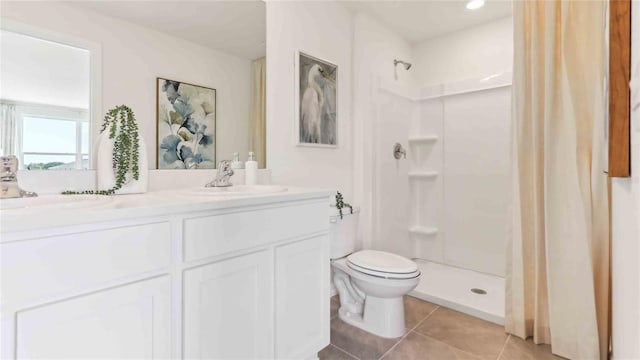 6591 SW 81st Loop, Ocala, FL 34476 - bathroom with toilet, tile patterned floors, a sink, and a stall shower