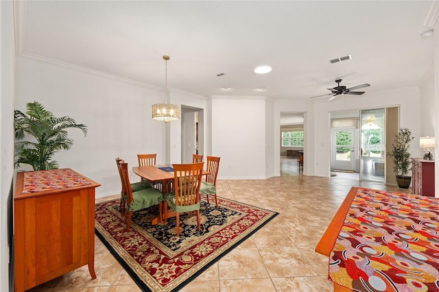 dining area with visible vents, baseboards, ornamental molding, and light tile patterned floors