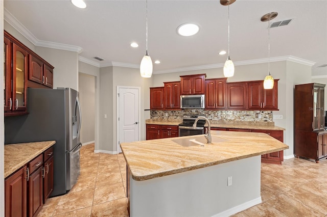 kitchen featuring backsplash, hanging light fixtures, stainless steel appliances, and a sink