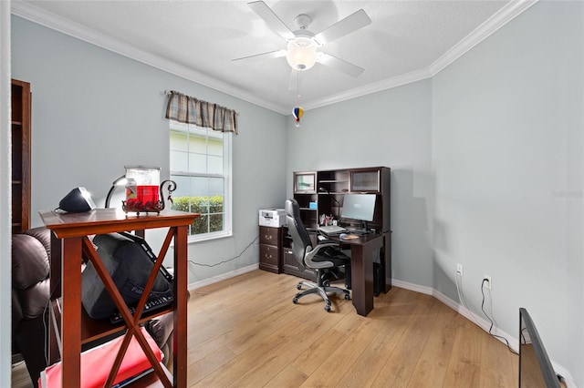 office featuring ceiling fan, baseboards, crown molding, and light wood finished floors