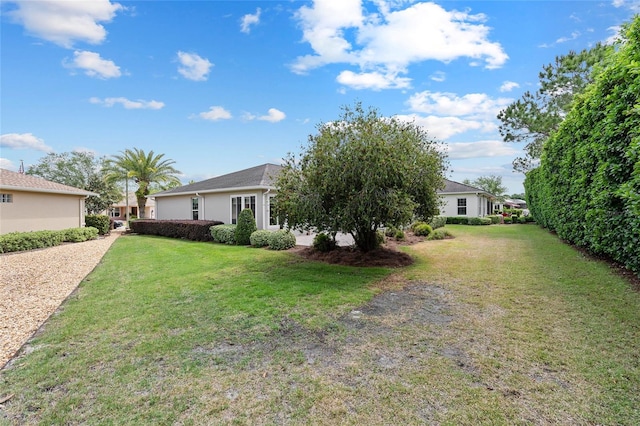 view of front facade with a front yard