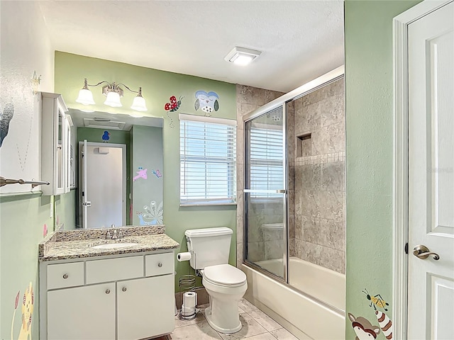 5327 SW 89th St, Ocala, FL 34476 - full bathroom featuring vanity, enclosed tub / shower combo, tile patterned floors, and toilet