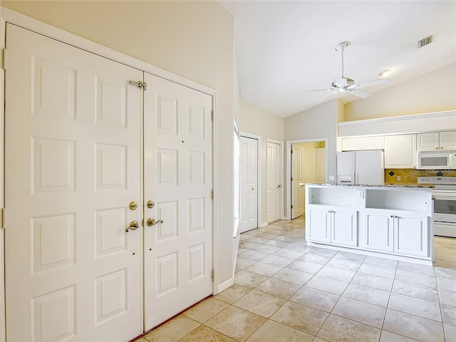 5327 SW 89th St, Ocala, FL 34476 - entrance foyer featuring baseboards, ceiling fan, lofted ceiling, and visible vents