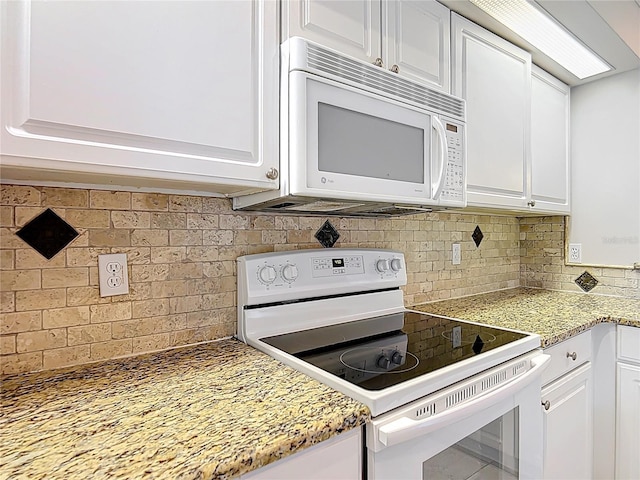 5327 SW 89th St, Ocala, FL 34476 - kitchen featuring white cabinets, backsplash, and white appliances