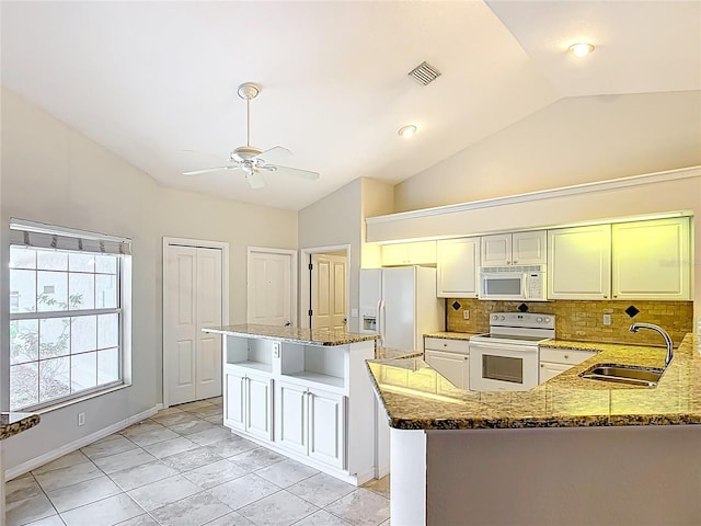 5327 SW 89th St, Ocala, FL 34476 - kitchen with ceiling fan, a center island, a sink, lofted ceiling, and white appliances