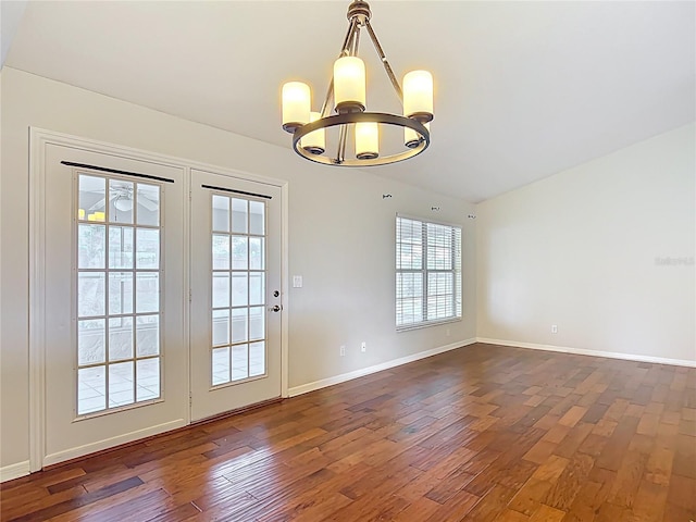 5327 SW 89th St, Ocala, FL 34476 - doorway featuring baseboards, a notable chandelier, and dark wood-style floors
