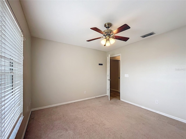 5327 SW 89th St, Ocala, FL 34476 - unfurnished room featuring a ceiling fan, baseboards, visible vents, and a healthy amount of sunlight