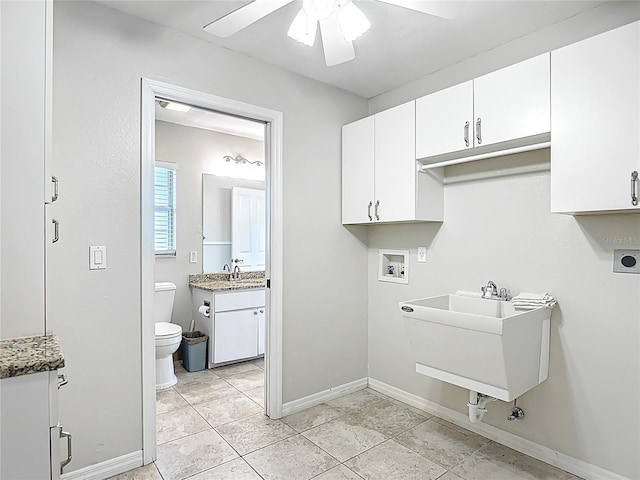 5327 SW 89th St, Ocala, FL 34476 - clothes washing area featuring a sink, baseboards, a ceiling fan, washer hookup, and hookup for an electric dryer
