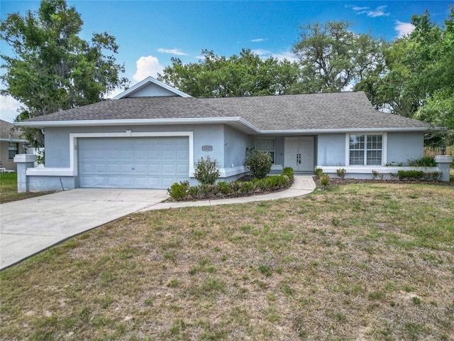 5327 SW 89th St, Ocala, FL 34476 - ranch-style home featuring stucco siding, an attached garage, concrete driveway, a front yard, and a shingled roof