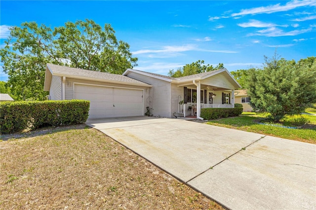10989 SW 86th Ave, Ocala, FL 34481 - ranch-style home featuring a porch, a front lawn, concrete driveway, and an attached garage