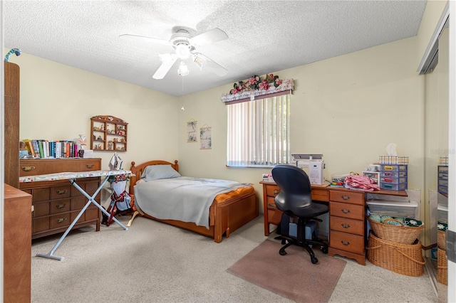 10989 SW 86th Ave, Ocala, FL 34481 - carpeted bedroom with a textured ceiling, a ceiling fan, and a closet