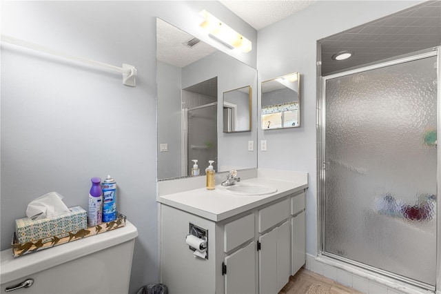 10989 SW 86th Ave, Ocala, FL 34481 - bathroom with toilet, visible vents, vanity, and a stall shower