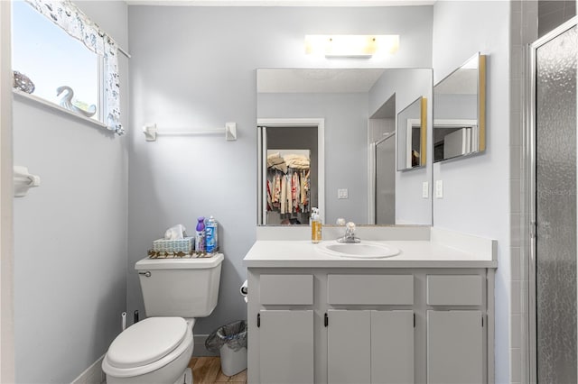 10989 SW 86th Ave, Ocala, FL 34481 - bathroom featuring toilet, a shower stall, and vanity