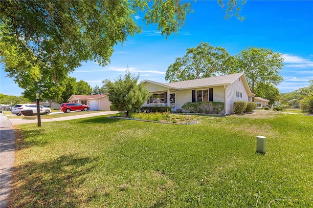 10989 SW 86th Ave, Ocala, FL 34481 - ranch-style house featuring driveway and a front yard
